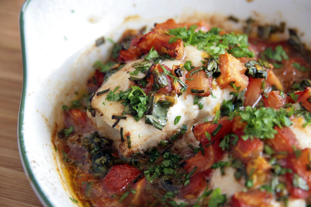 Baked cod and tomatoes